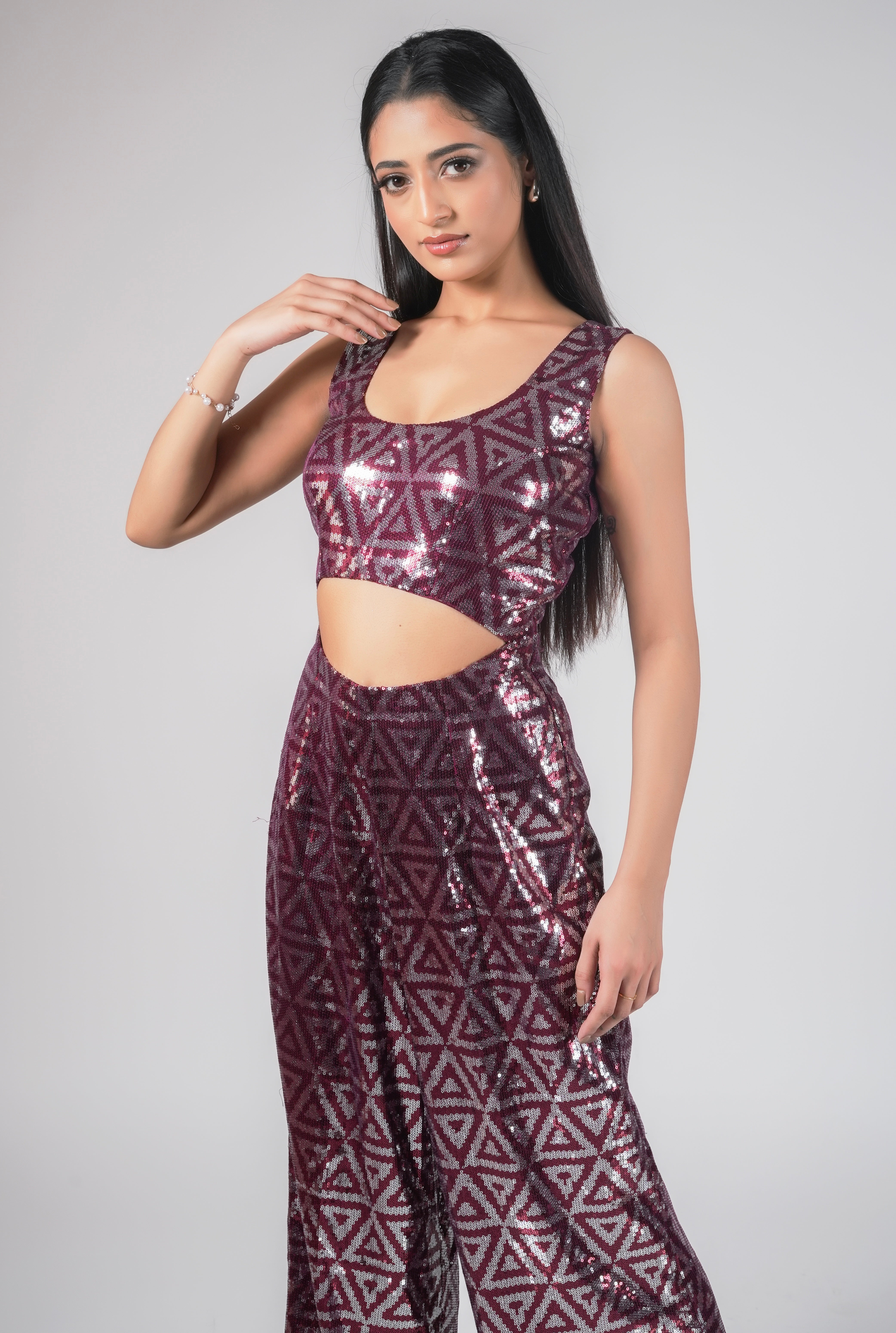 RED SEQUIN JUMPSUIT WITH CUT OUTS